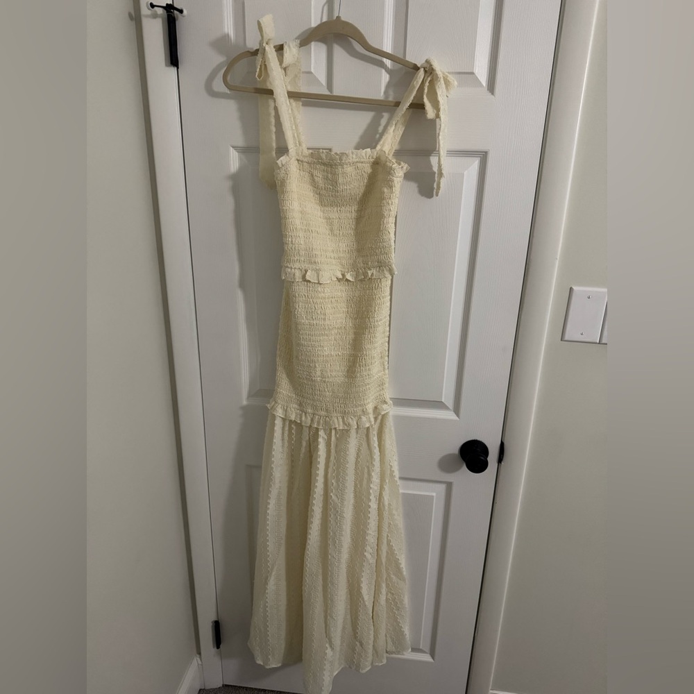 Ivory midi dress.